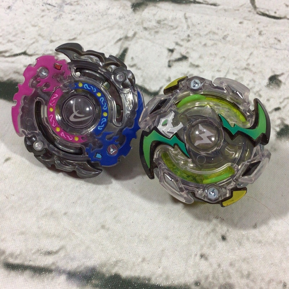 Beyblade Burst Evolution Lot Of 2 Spinners Rip Fire Phantazus